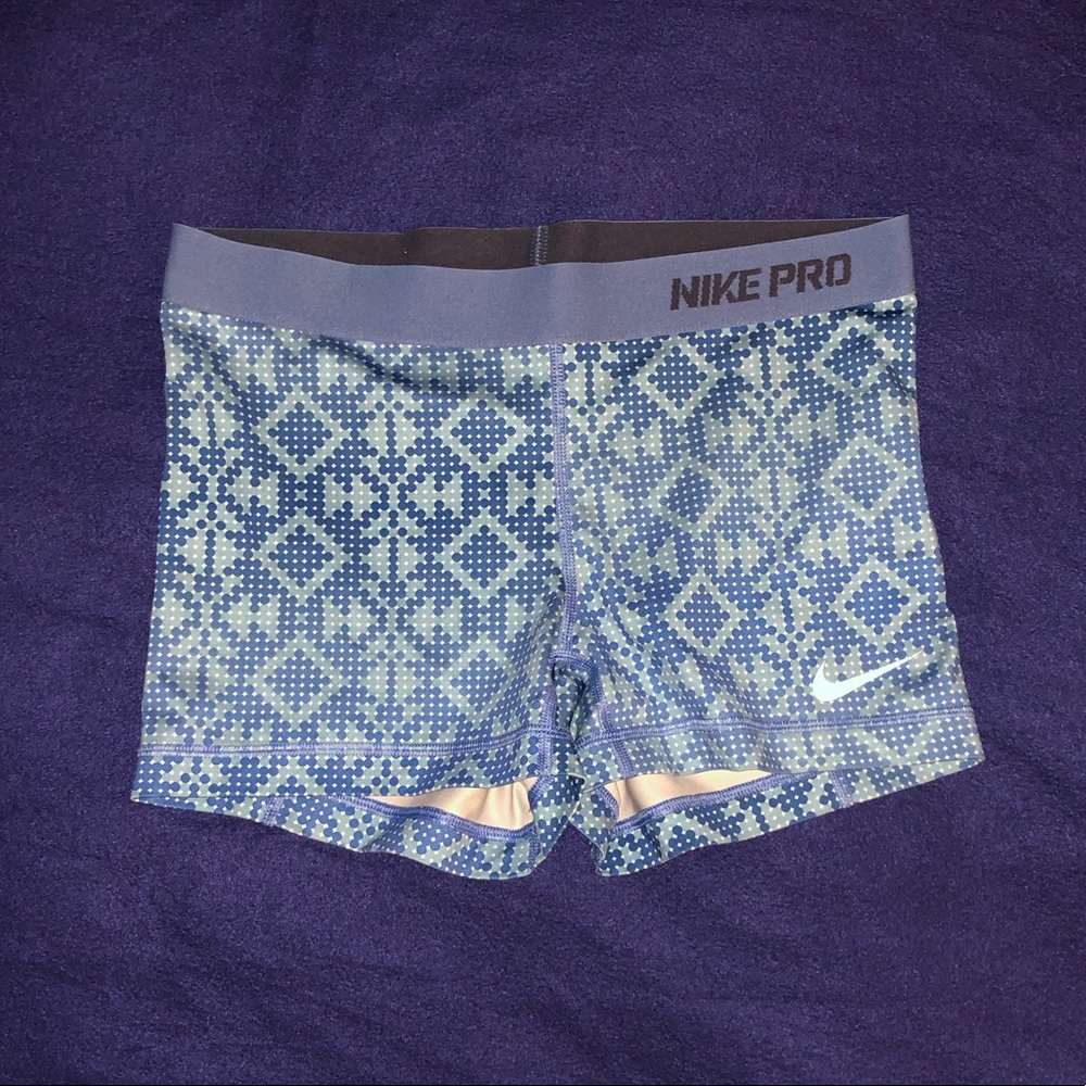 Blue Nike Pro shorts, size M